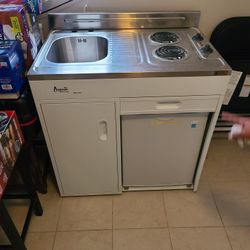 Compact Kitchen With Electric Stove Top