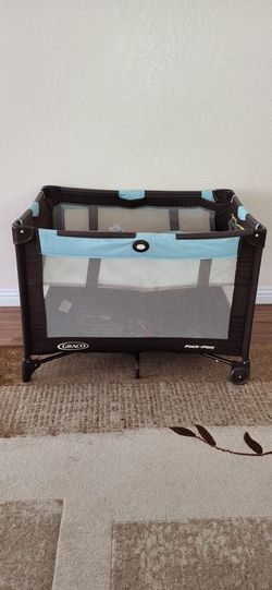 Practically New Graco Baby Playpen ( Used Once). Price Firm!