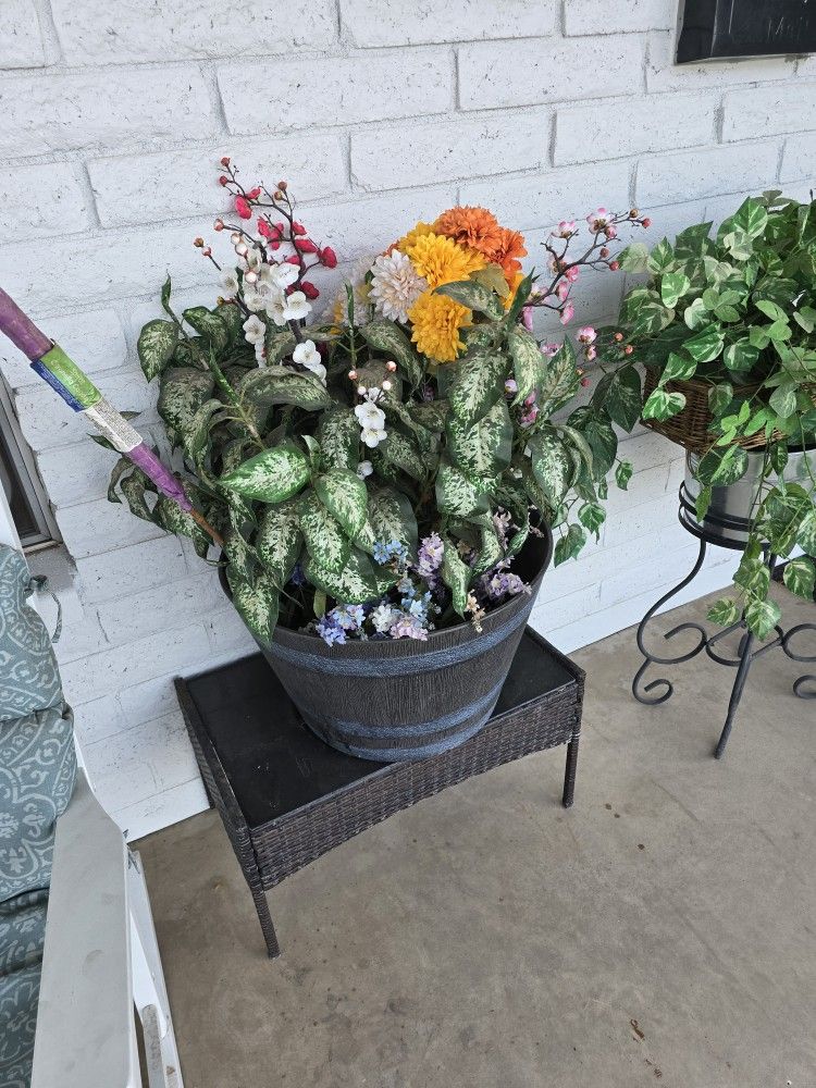 Out Door Planter With Fake Foliage.