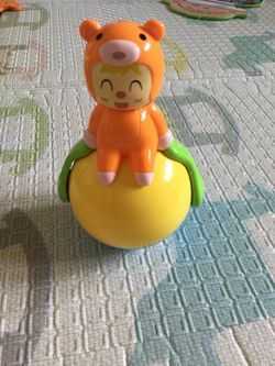 Tilting poly yo-yo never falling toy with sound