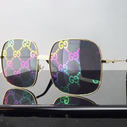 Gucci Geometric Sunglasses in Gold with GG Pattern Lens