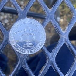 One Troy one fine silver
