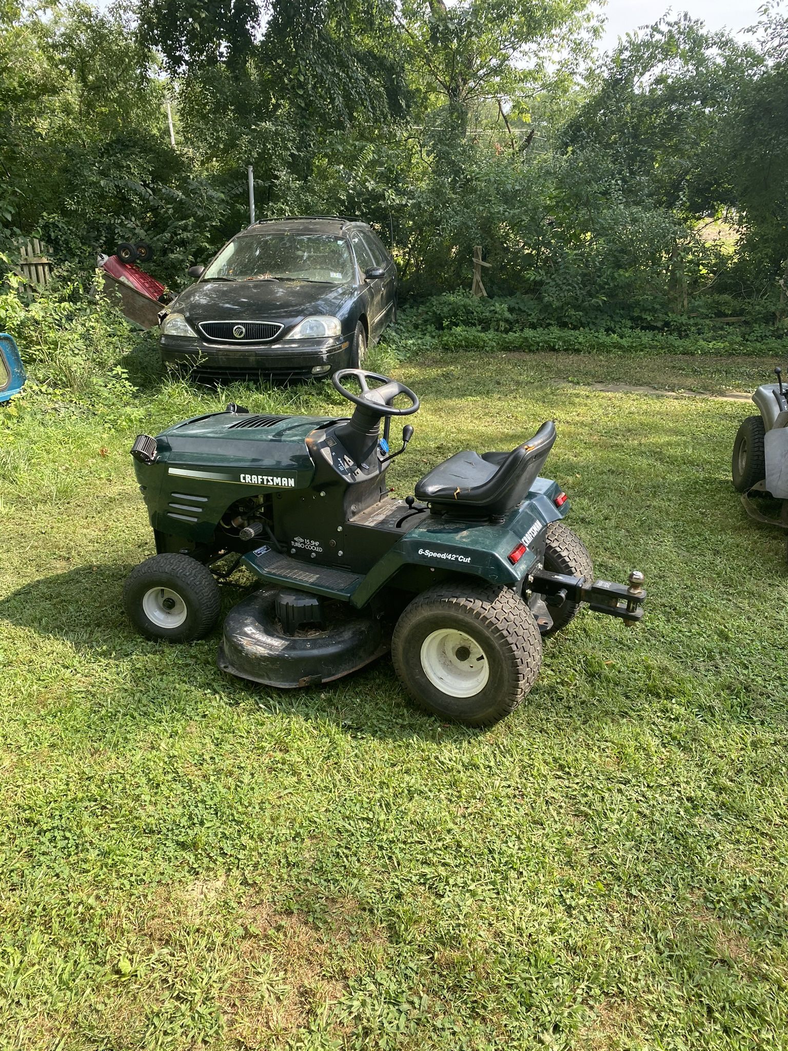 Riding lawnmower And Plow 