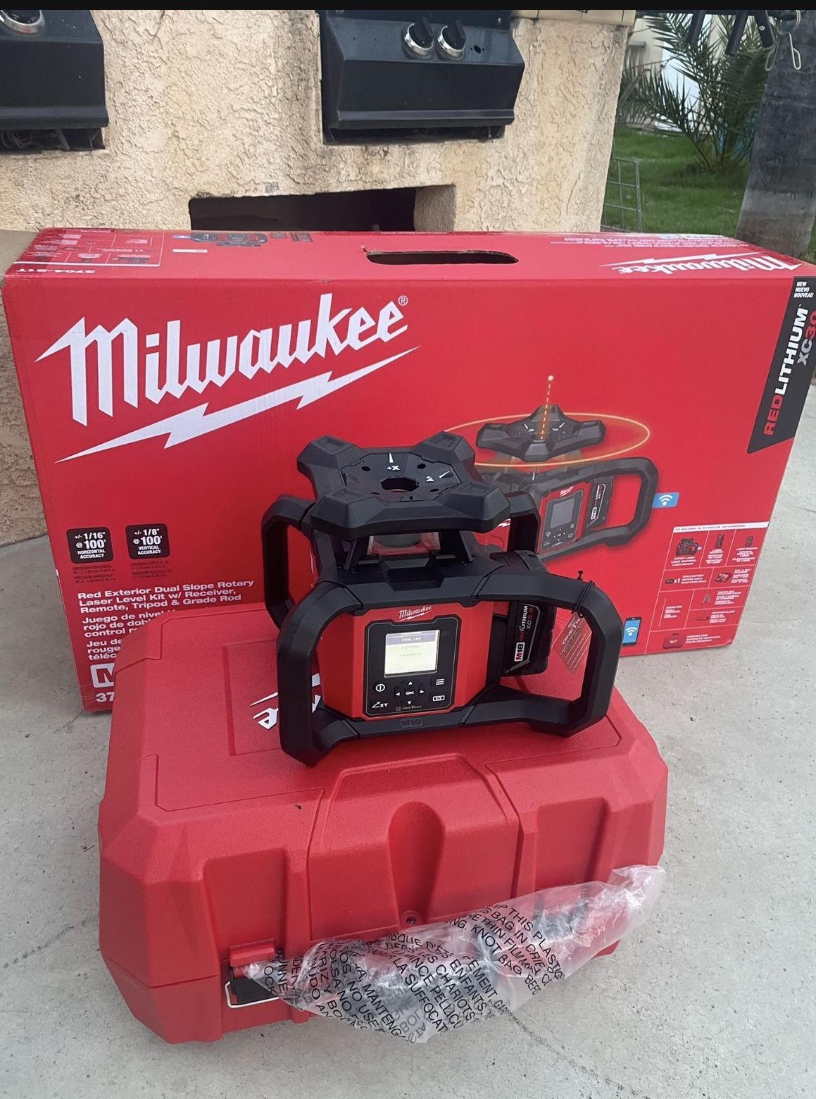 M18 4000 ft. Red Exterior Dual Slope Rotary Laser Level Kit with Receiver, Remote, Grade Rod and Tripod