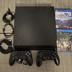 PS4 Pro With 2 Controllers And 2 Games