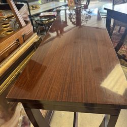 mahogany console table with curved, X-shaped legs - 60” x 20” x 35”