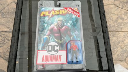 Aquaman action figure and comic book