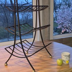 Late 20th Century Black Iron Magazine or Firewood Stand With Gold Accents