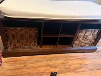 Entryway storage bench with cushion