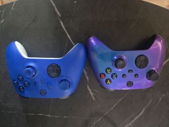 Two Xbox controllers