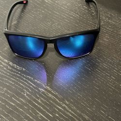  Oakley Sylas sunglasses (model OO9448F-0458 or similar variant in the OO9448F series), specifically the Low Bridge Fit version designed for 