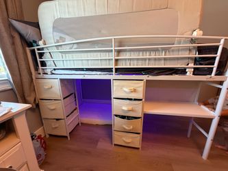 Miniature bunk bed with drawers and desk