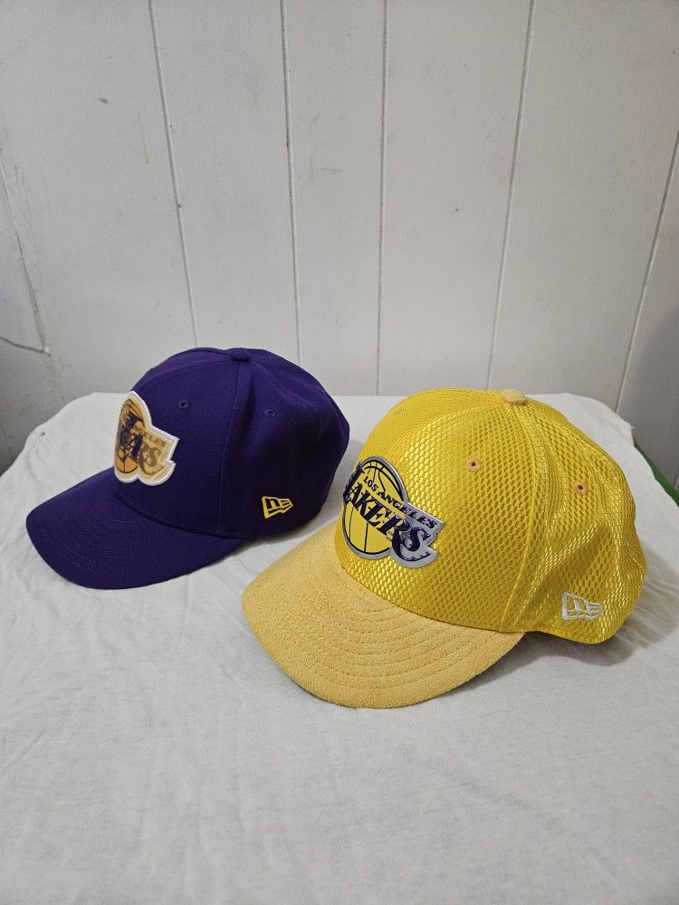 L.A.Lakers Purple Hat & Yellow Hat Size 7 1/8 Gently Used Great Condition $15 Each