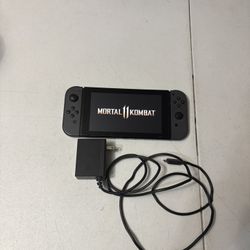 Nintendo Switch Console System with charger only. No games.