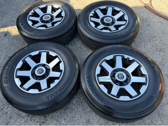 17” Toyota take off aluminum wheels mounted with new set of Yokohama tires for sale 6 lug.