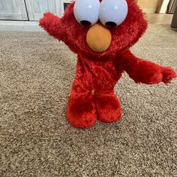 Elmo Plush hokey pokey Toy(sings but doesn’t move)