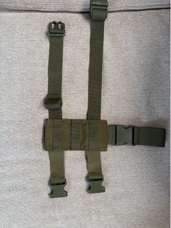 Molle drop leg holster double strap.