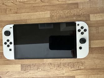 Nintendo Switch OLED w/ Joycons