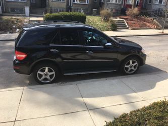 2009 ML550 MERCEDES BENZ- V-8 BLACK SUV