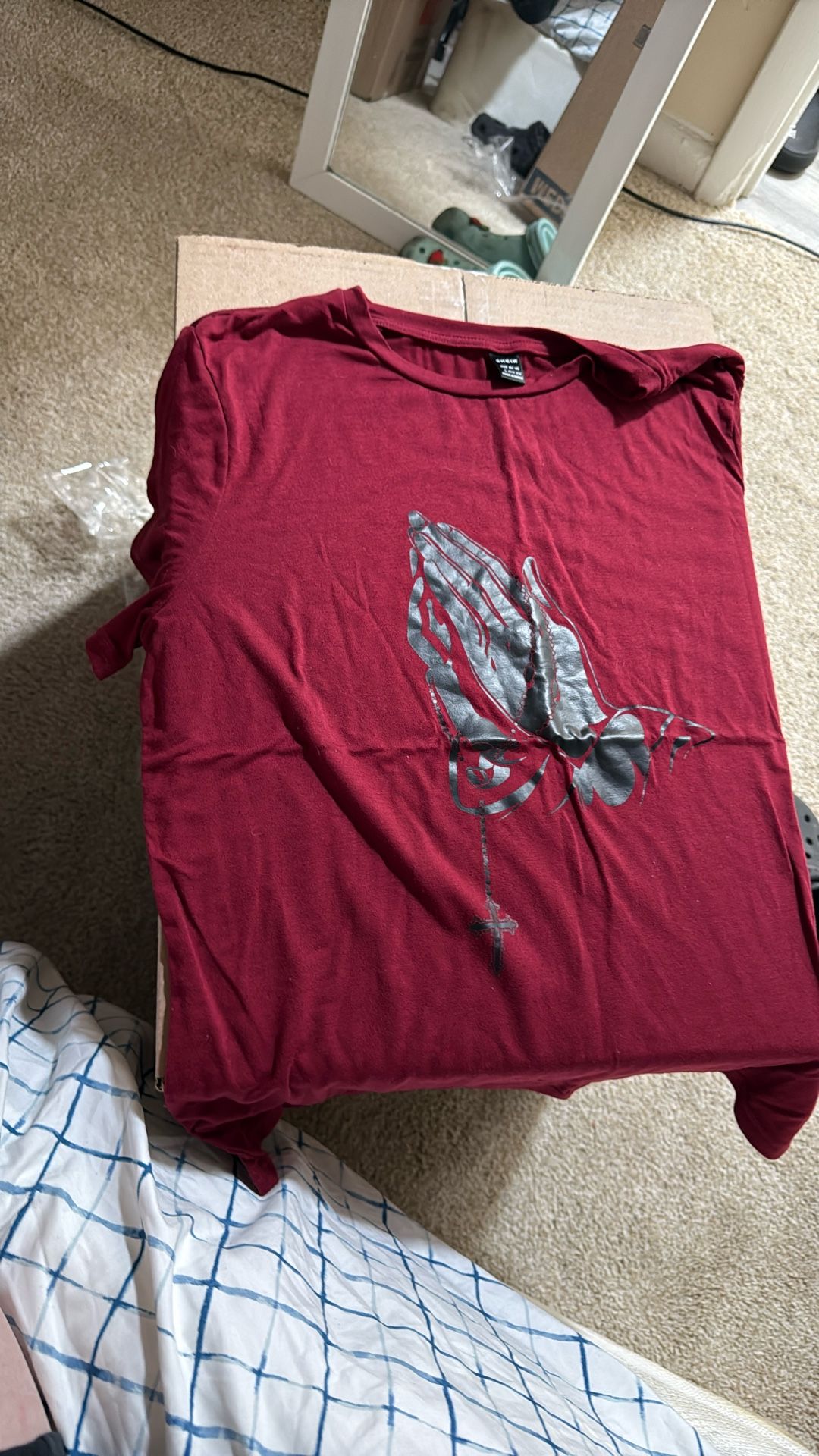 Red hand cross shirt