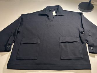 Women's Banana Republic black V-neck polo sweater, long sleeve, size L, with pockets.