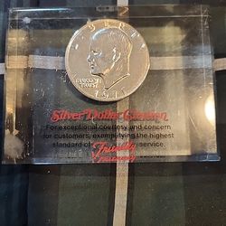 FRIENDLY'S 1971 EISENHOWER DOLLAR  IN ACRYLIC PAPER WEIGHT--UNCIRCULATED