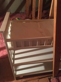 White wooden changing table