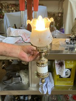 Vintage brass and porcelain hurricane-style wall sconce