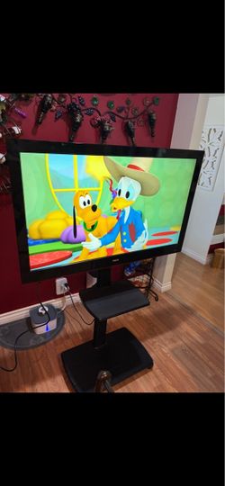 RCA Flat Screen TV with Floor Stand