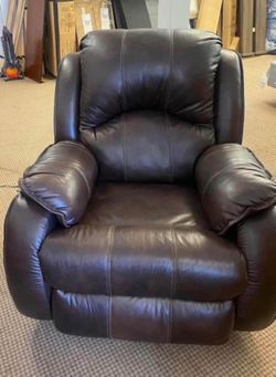 BROWN LEATHER POWER ROCKER RECLINING CHAIR