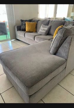 Beautiful light grey sectional couch from Ashley furniture