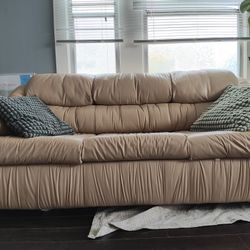 tan leather pullout couch 
