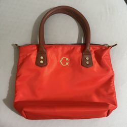 C. Wonder Red Nylon Tote Bag with Brown Handles