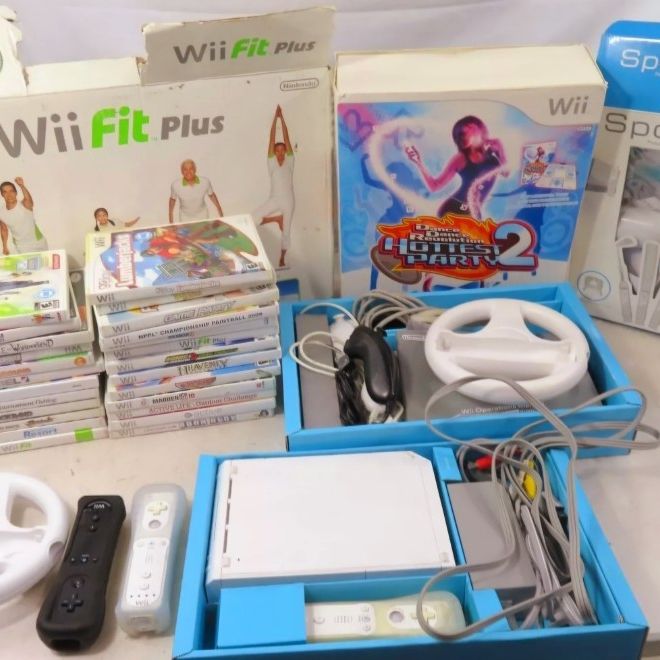 Huge Wii Bundle. Console with 4 Controllers, Balance Board, Accessories, & 26 Games