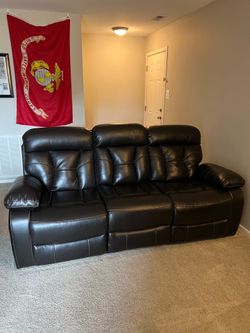 Raymour and Flanigan reclining leather couch