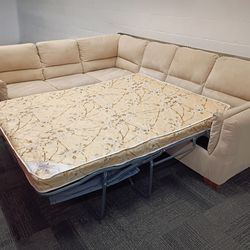 Free Delivery Today 🏠🛻.  Steam cleaned Like New. L sectional couch with a never used pullout bed. No stains or rips.