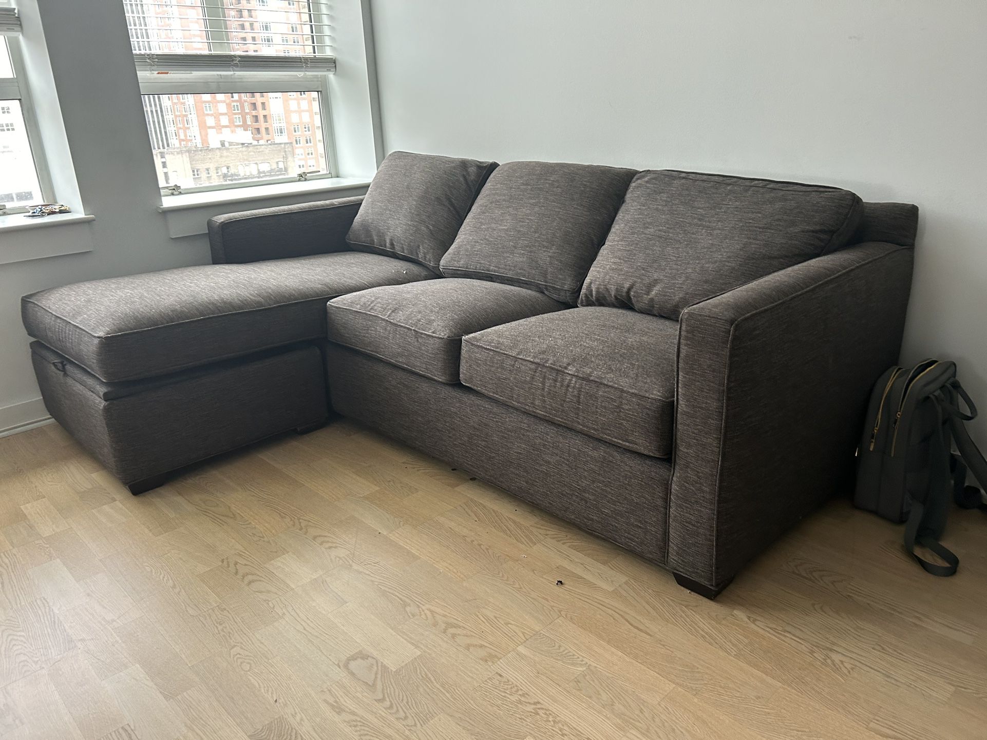 Reversible Sectional With Storage Ottoman 
