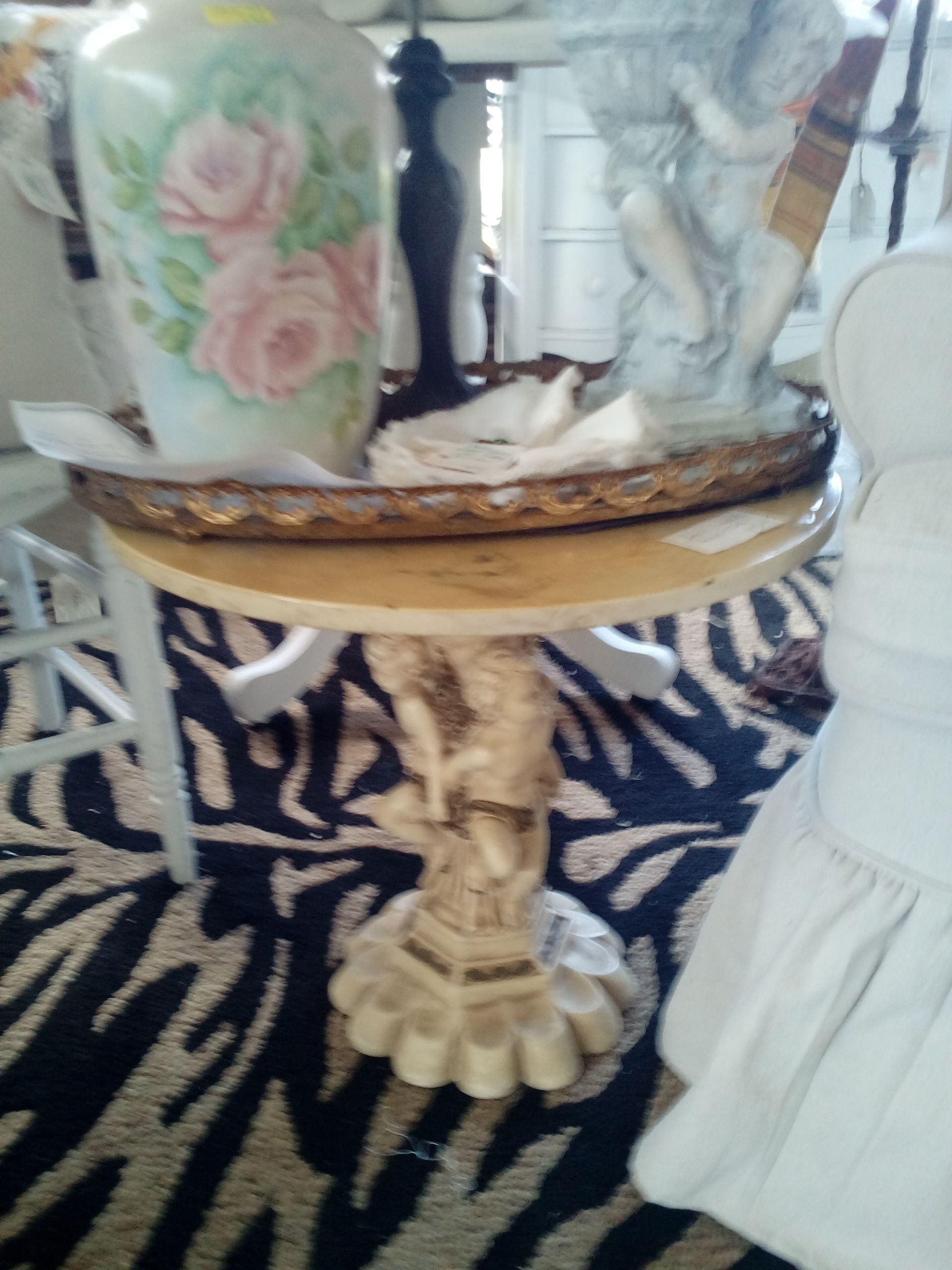 Marble top figural base occasional table