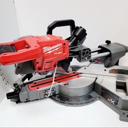 Milwaukee FUEL Brushless miter saw. This powerful saw is still in its original packaging, ready for any project. Has a red and grey finish.