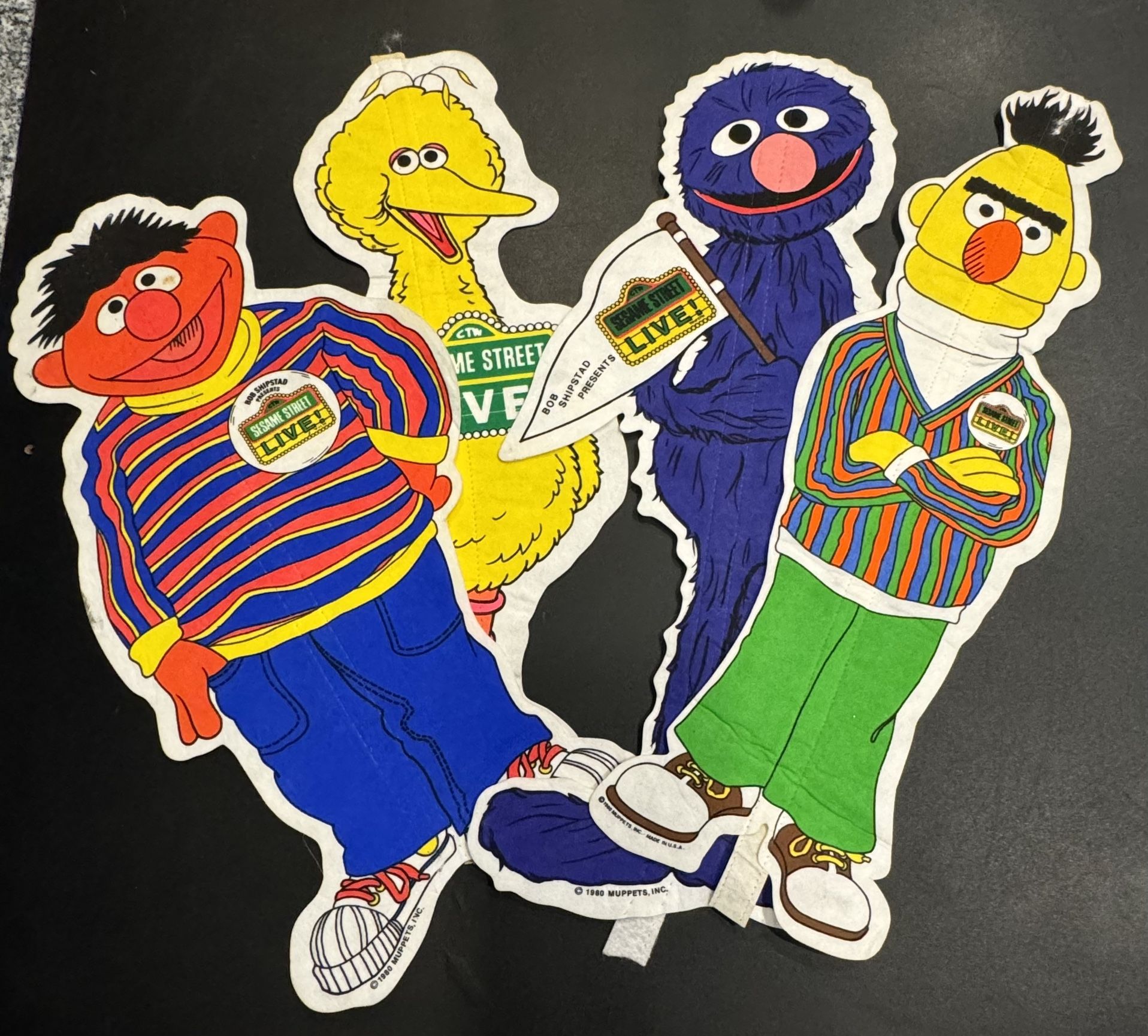 4 Vintage 1980 Muppets, Inc. Bob Shipstad Sesame Street Pennant, includes Big Bird, Ernie, Grover, & Bert. Good condition. A few small blemishes shown