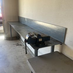 heavy metal bench and large vise.