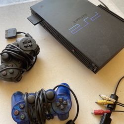 PlayStation 2 With Games .. Ready To Plug and play