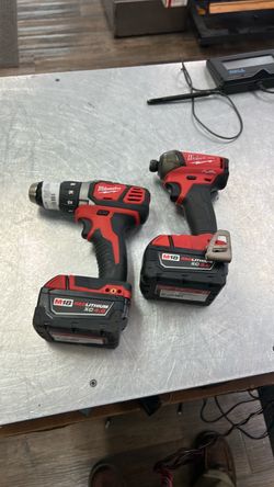 1003 Milwaukee 2606-20, 2760-20 M18v Lithium Ion 1-2” Drill Driver and 1/4” Hex Impact Driver W/ 3.0ah & 4.0ah Batteries 568381