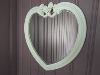 Big heart shape mirror with. Roses designs