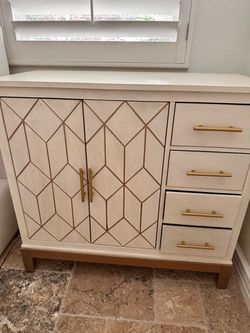 Home goods accent cabinet