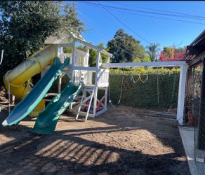 Genuine oak playset with 3 swings and 3 slides