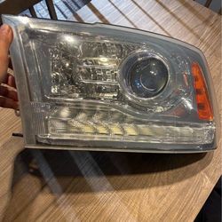 13-18 Drivers Side OEM Ram Projector Headlight