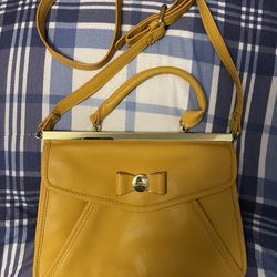 Lulu Guinness, yellow Crossbody purse and perfect condition