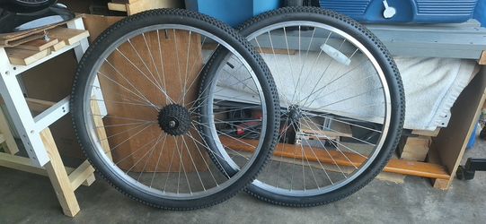 TWO SET OF TIRES WIHT RIMS 27.5 AND ONE SET OF TIRES ONLY 27.5