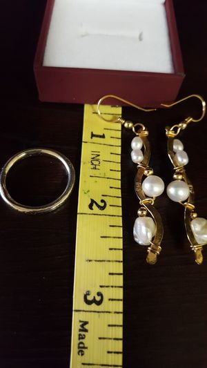 Photo Earrings and Ring, the Ring is marked 925 Sterling Silver Sz 7.75. The earrings are gold Filled with pearls on it. 7.62grs all together. P